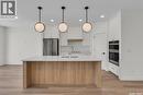 20 720 Brighton Boulevard, Saskatoon, SK  - Indoor Photo Showing Kitchen With Upgraded Kitchen 