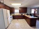 706 Railway Street, Chitek Lake, SK  - Indoor Photo Showing Kitchen With Double Sink 
