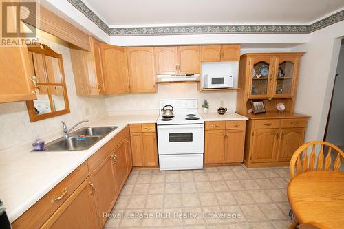 101 - 1-497 Birmingham St West Street W, Wellington North (Mount Forest), ON - Indoor Photo Showing Kitchen With Double Sink