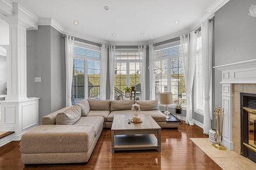 Salon - 451 Boul. De Fontainebleau, Blainville, QC - Indoor Photo Showing Living Room With Fireplace