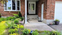 Covered Entry right to extra door to garage! - 