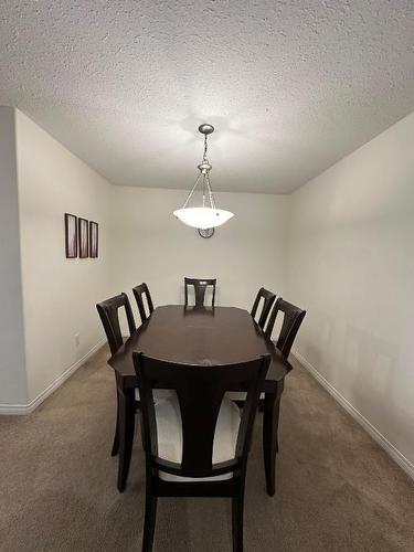210-4767 Forsters Landing Road, Radium Hot Springs, BC - Indoor Photo Showing Dining Room