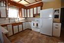 220 2Nd Street E, Nipawin, SK  - Indoor Photo Showing Kitchen With Double Sink 