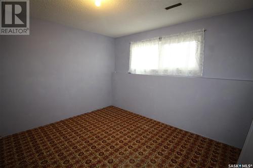 128 1St Street E, Frontier, SK - Indoor Photo Showing Other Room