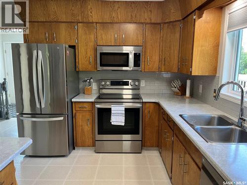 Pohler Acreage, Spalding, SK - Indoor Photo Showing Kitchen With Stainless Steel Kitchen With Double Sink