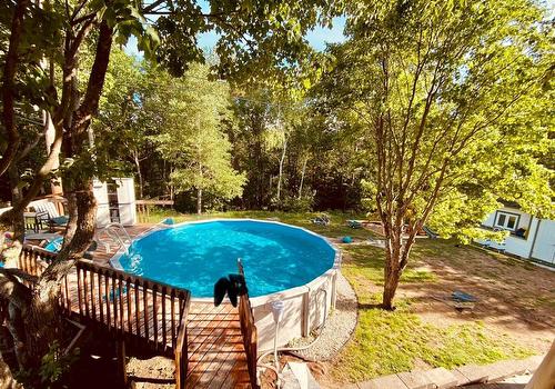 Cour - 132 Rue Lafort, Témiscaming, QC - Outdoor With Above Ground Pool