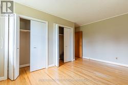 Primary bedroom with double closets - 