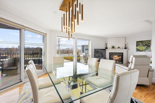 Dining room - 4-300 Rue Du Moulin, Magog, QC - Indoor With Fireplace