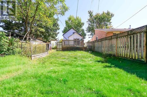 This photo has been AI enhanced. - 122 Trinity Street, Stratford, ON - Outdoor With Deck Patio Veranda