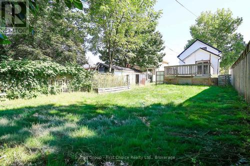 This photo has been AI enhanced. - 122 Trinity Street, Stratford, ON - Outdoor With Deck Patio Veranda