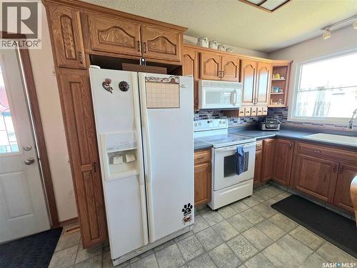 101 Fraser Avenue, Oxbow, SK - Indoor Photo Showing Kitchen With Double Sink
