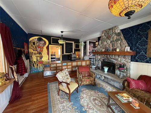 9215 Main Avenue, Wilmer, BC - Indoor Photo Showing Other Room With Fireplace