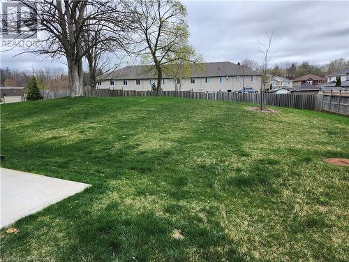 View of rear yard featuring fence and a residential view - 415 Water Street S, Cambridge, ON 