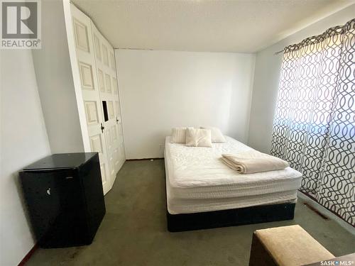 209 3Rd Avenue W, Frontier, SK - Indoor Photo Showing Bedroom