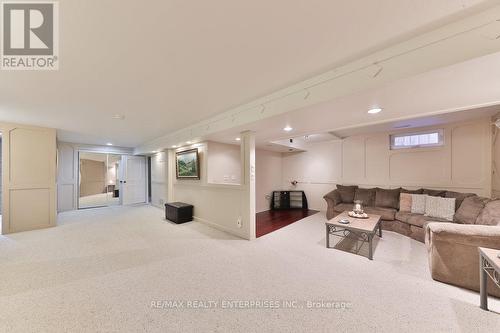 Double Sliding Door Closet - 4061 Rolling Valley Drive, Mississauga, ON - Indoor Photo Showing Basement