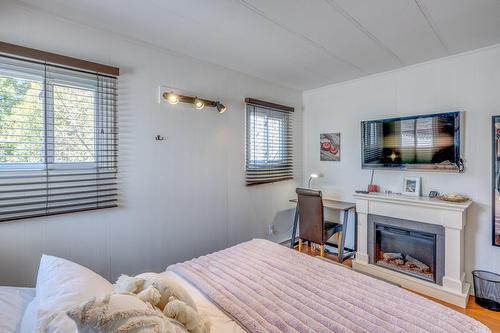 Bedroom - 13 Boul. Grand-Prix, Laval (Vimont), QC - Indoor Photo Showing Other Room With Fireplace