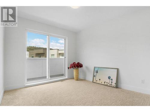 Third Bedroom on top floor - 720 Valley Road Unit# 46, Kelowna, BC - Indoor Photo Showing Other Room
