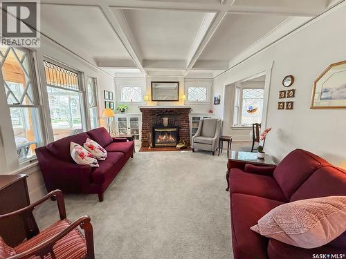 570 4Th Avenue Ne, Swift Current, SK - Indoor Photo Showing Living Room With Fireplace