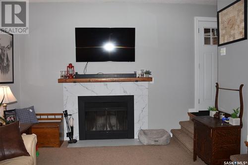 119 Dewdney Street, Indian Head, SK - Indoor Photo Showing Living Room With Fireplace