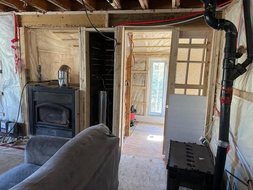 Salon - 7152 Ch. De L'Orignal, Duhamel, QC - Indoor Photo Showing Basement With Fireplace