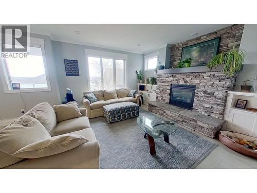 10604 108 Street, Fort St. John, BC - Indoor Photo Showing Living Room With Fireplace