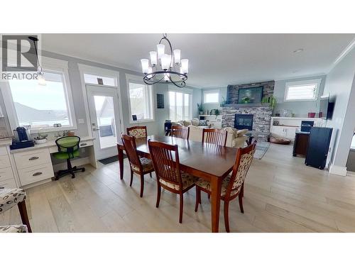 10604 108 Street, Fort St. John, BC - Indoor Photo Showing Dining Room With Fireplace