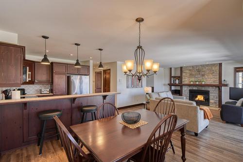 Overall view - 1-250 Rue Du Mont-Plaisant, Mont-Tremblant, QC - Indoor Photo Showing Dining Room With Fireplace