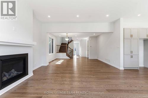 2026 Wanderer Avenue, Ottawa, ON - Indoor Photo Showing Living Room With Fireplace