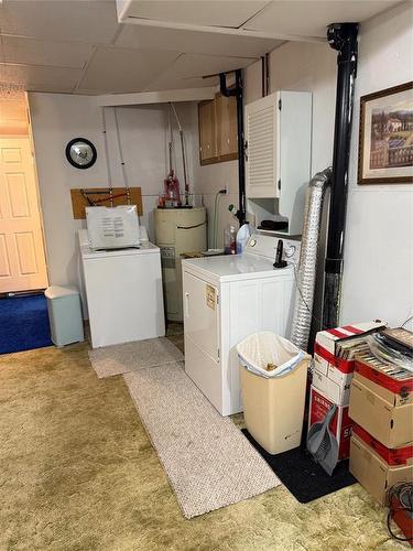77 Railway Avenue, Benito, MB - Indoor Photo Showing Laundry Room