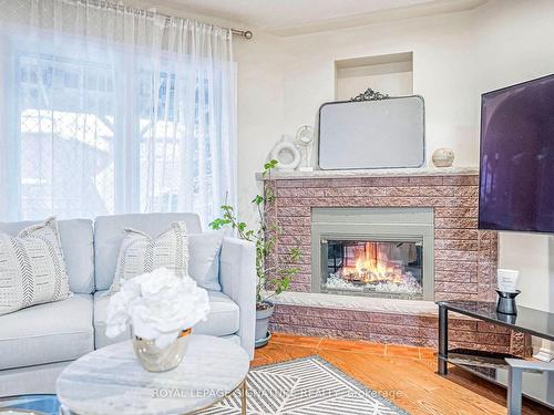 554 Galaxy Court, Mississauga, ON - Indoor Photo Showing Living Room With Fireplace