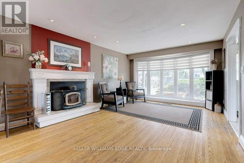 4451 Cosburn Crescent, Burlington, ON - Indoor Photo Showing Living Room With Fireplace