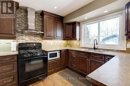 4451 Cosburn Crescent, Burlington, ON - Indoor Photo Showing Kitchen With Double Sink