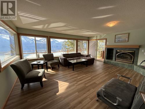 9703 3A Highway, Kuskanook, BC - Indoor Photo Showing Living Room With Fireplace