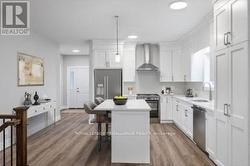 Virtually staged photo, photo of a different build - 