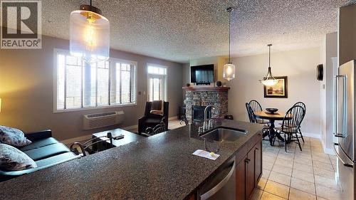 400 Bighorn Boulevard Unit# 412 A, Radium Hot Springs, BC - Indoor With Fireplace