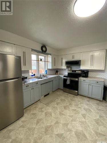 220 Elm Street, Porcupine Plain, SK - Indoor Photo Showing Kitchen With Double Sink