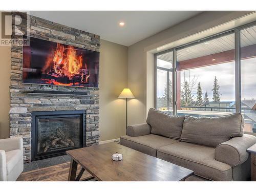 9834 Cathedral Drive, Silver Star, BC - Indoor Photo Showing Living Room With Fireplace