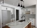 174 Doran Way, Saskatoon, SK  - Indoor Photo Showing Kitchen With Double Sink 