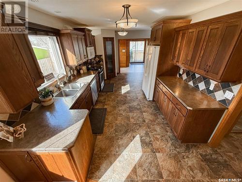 11 Conlin Drive, Swift Current, SK - Indoor Photo Showing Kitchen With Double Sink