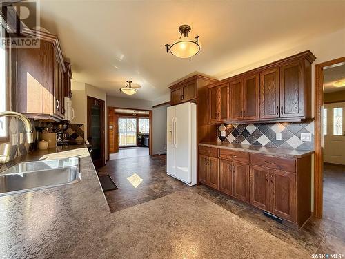 11 Conlin Drive, Swift Current, SK - Indoor Photo Showing Kitchen With Double Sink