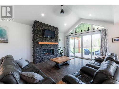 7400 Taborview Drive, Prince George, BC - Indoor Photo Showing Living Room With Fireplace