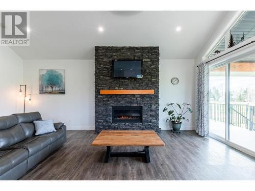 7400 Taborview Drive, Prince George, BC - Indoor Photo Showing Living Room With Fireplace