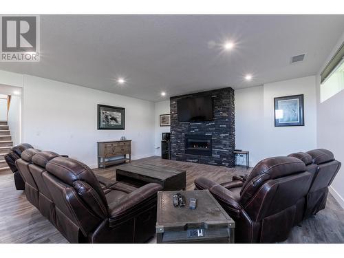 7400 Taborview Drive, Prince George, BC - Indoor Photo Showing Living Room With Fireplace