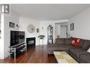 1055 Lawrence Avenue Unit# 202, Kelowna, BC  - Indoor Photo Showing Living Room With Fireplace 