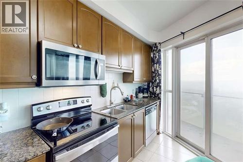 50 Absolute Avenue Unit# 3801, Mississauga, ON - Indoor Photo Showing Kitchen With Double Sink