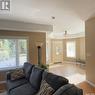 82 Estates Drive, Elk Ridge, SK  - Indoor Photo Showing Living Room 