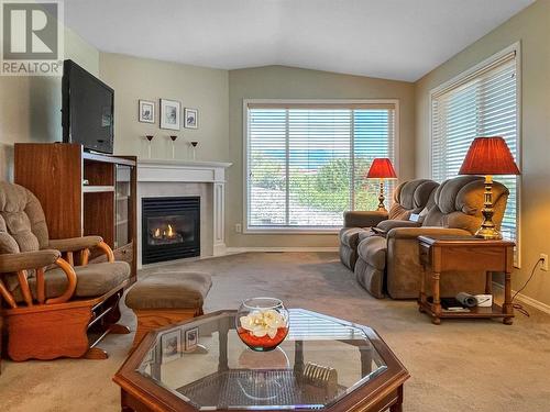 9400 115Th Street Unit# 52, Osoyoos, BC - Indoor Photo Showing Living Room With Fireplace