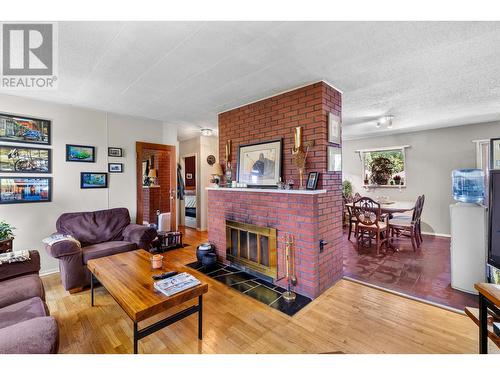 772 Otter Lake Cross Road, Spallumcheen, BC - Indoor Photo Showing Living Room With Fireplace