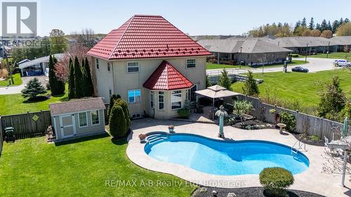 101 Rudy Avenue, East Zorra-Tavistock (Tavistock), ON - Outdoor With In Ground Pool With Deck Patio Veranda