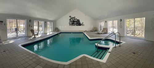 Piscine - 102-273 Ch. Des Grappes, Piedmont, QC - Indoor Photo Showing Other Room With In Ground Pool